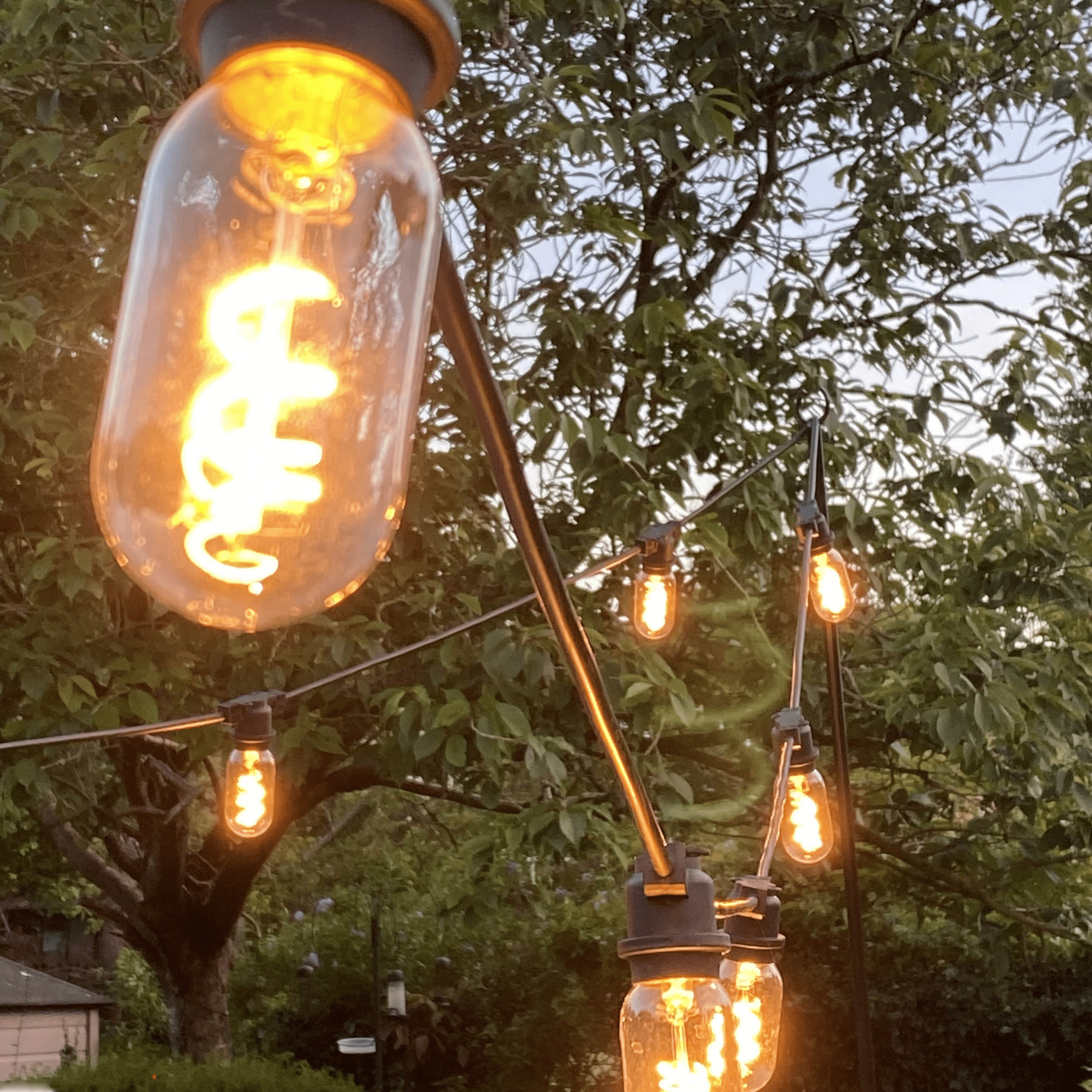 Fixed Festoon Cable String lights with T45 Retro filament bulbs - The Outside Lighting Specialists